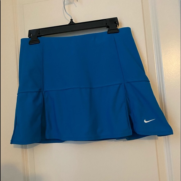 Nike size small tennis skirt, blue